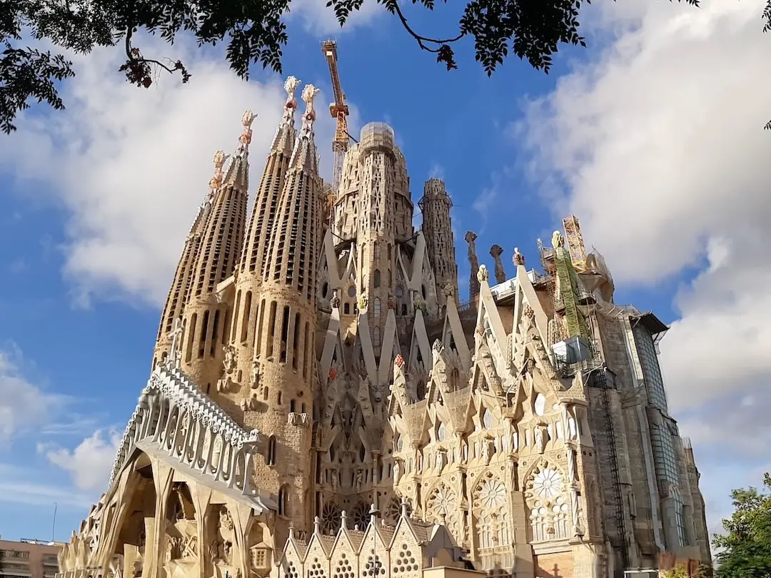 Looking at the Familia Sagrada in Barcelona from a far angle being able to see all the towers.