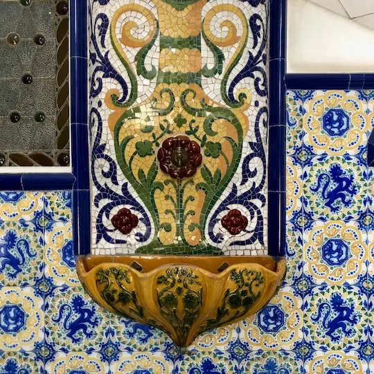 Barcelona Private Tour Gaudi Torre Bellesguard 40 An old basin to wash your hands covered with an elaborate mosaic out of tiles and ceramics.