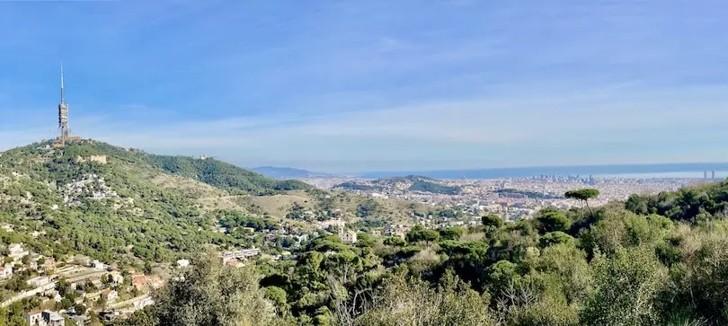 Panoramic view over Barcelona from the mountains towards the sea.
